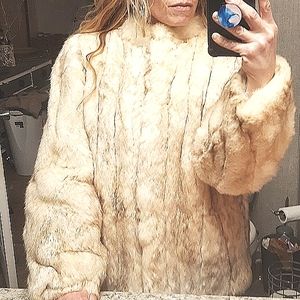 Glamorous vintage cream fur coat. Incredibly soft. Nearly perfect condition.
